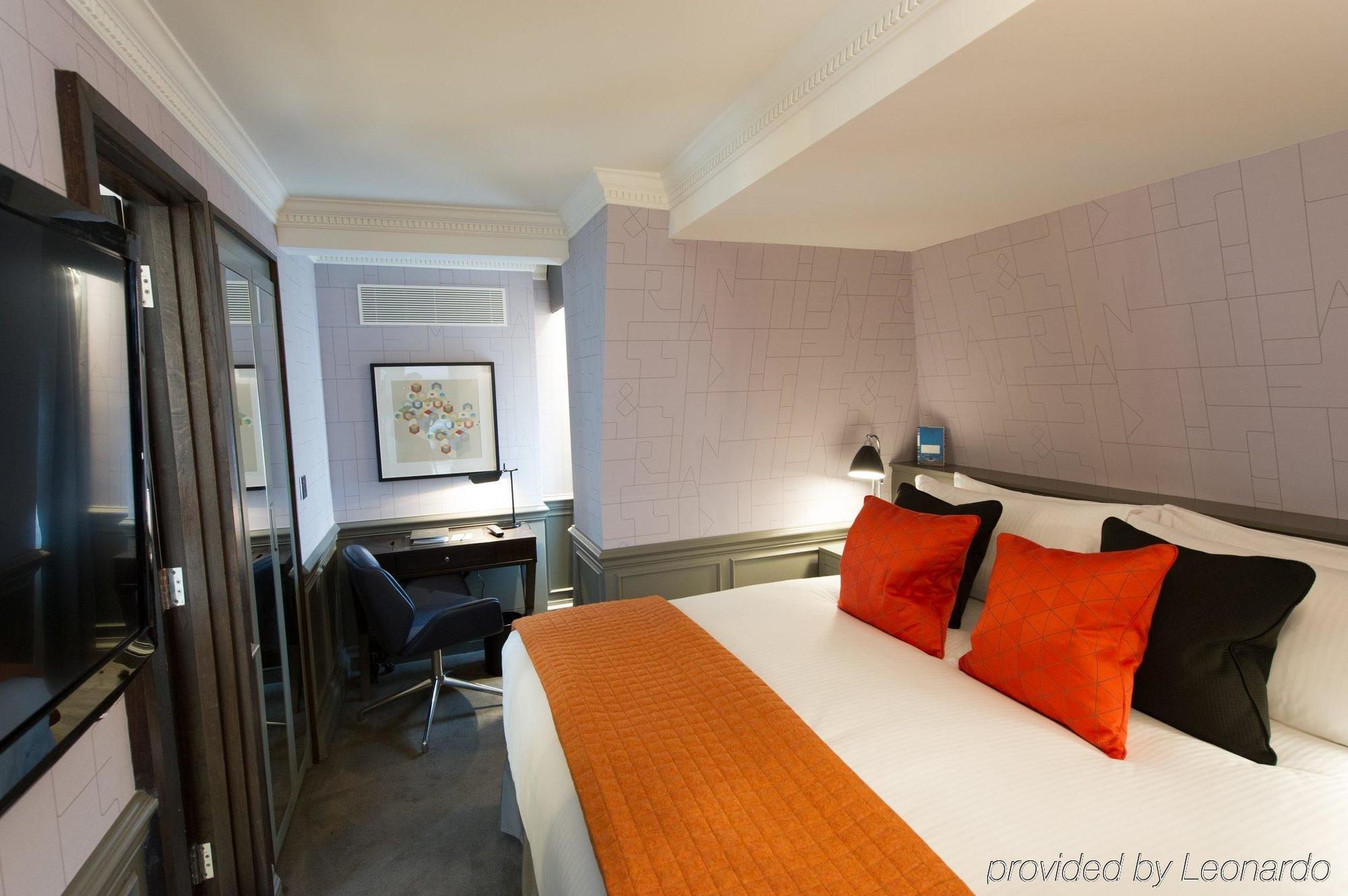 โรงแรมดิแอมเพอร์ซานด์ ลอนดอน ห้อง รูปภาพ A room at the hotel