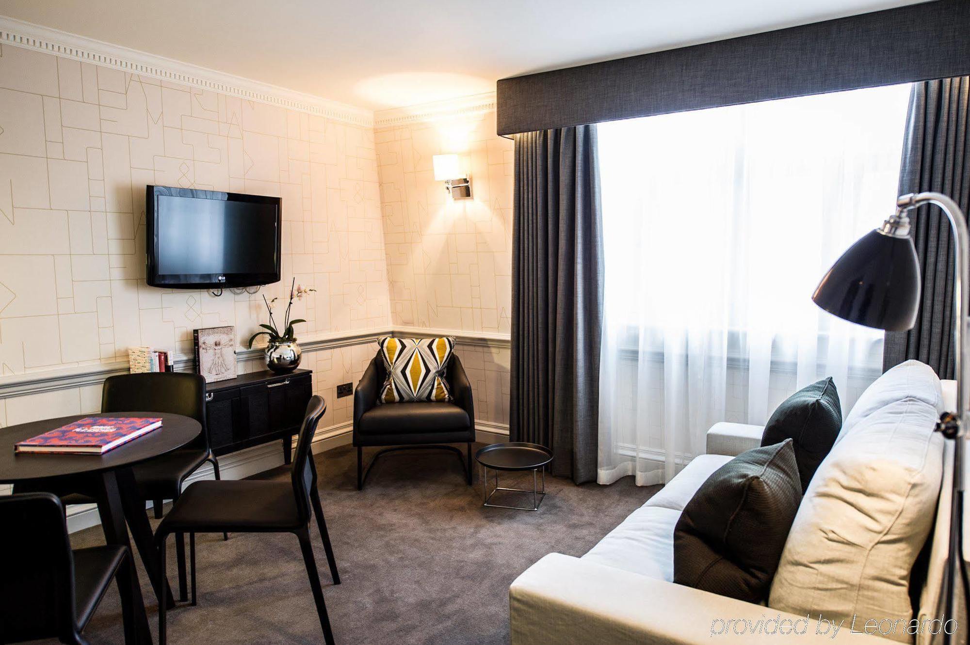 โรงแรมดิแอมเพอร์ซานด์ ลอนดอน ห้อง รูปภาพ A suite at the hotel
